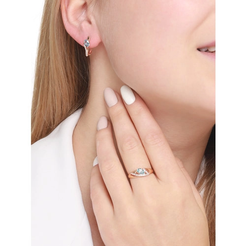 Кольцо из золота 585 пробы с топазом и финитами