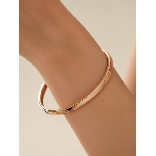 Жесткий браслет из золота 585 пробы с фианитами