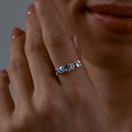 Кольцо из золота 585 пробы с топазами и топазом London Blue