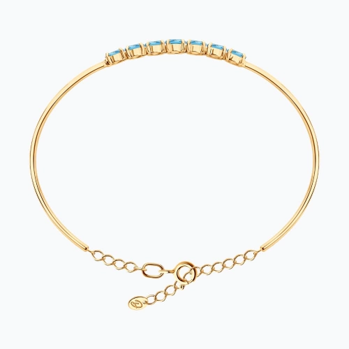 Жесткий браслет из золота 585 пробы с топазами