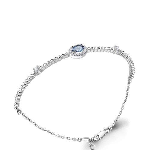 Жесткий браслет из серебра 925 пробы с топазами и фианитами