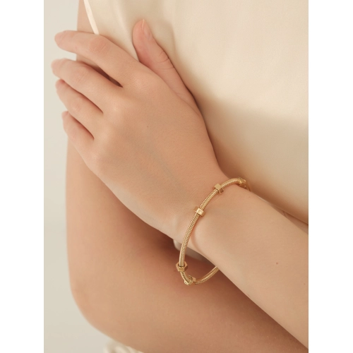 Жесткий браслет из желтого золота 585 пробы